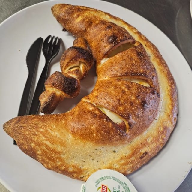 Philly Steak Stromboli and Garlic Knots.